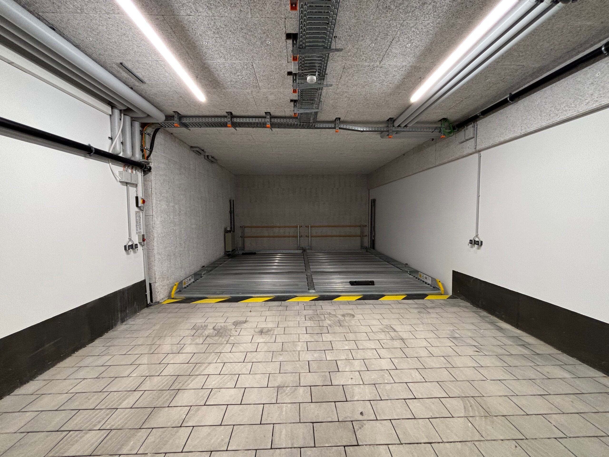 Duplex-Tiefgaragenstellplatz mit E-Lademöglichkeit in Gauting – Neubau